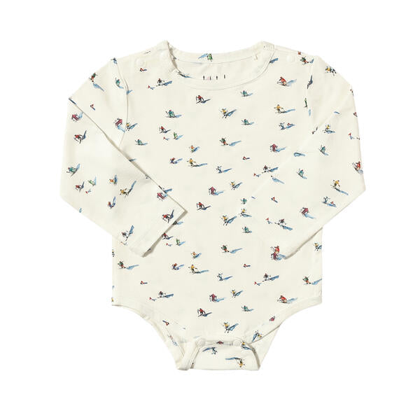 Onesie in white with sweet watercolour skiers print. With popper fastenings and made from soft bamboo fabric.