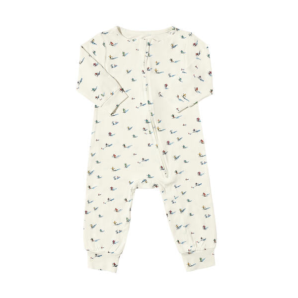 Romper with zip fastening in white with sweet watercolour skiers print. With long legs and sleeves, and made from soft bamboo fabric.