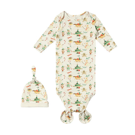 Cosy knotted sleep gown in white with sweet watercolour Christmas elves print. With matching knotted hat. Made from soft bamboo fabric.