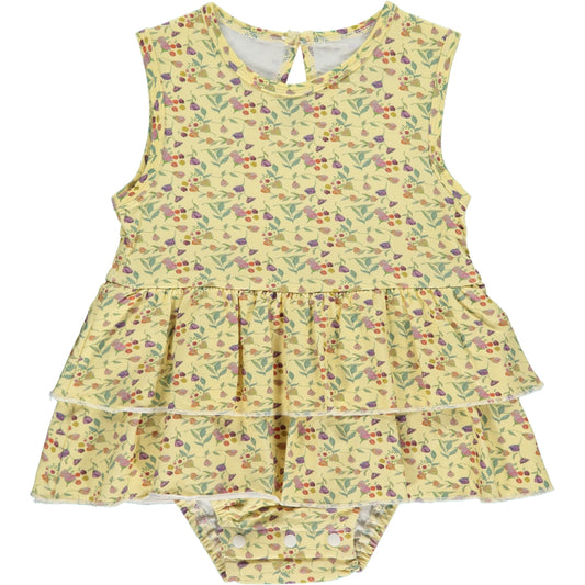 sleeveless summer onesie dress in yellow wildflower print with multicolor flowers, made of bamboo fabric, two frills on the skirt