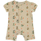 sleeveless shortie romper in bunnie rabbit and carrot print on a beige background, made of bamboo fabric, buttons on the placket