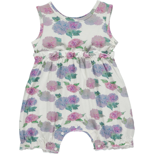 sleeveless girls shortie romper in pink and violet watercolor hydrangea print on a white background, made of bamboo fabric, small frills at the waist and leg