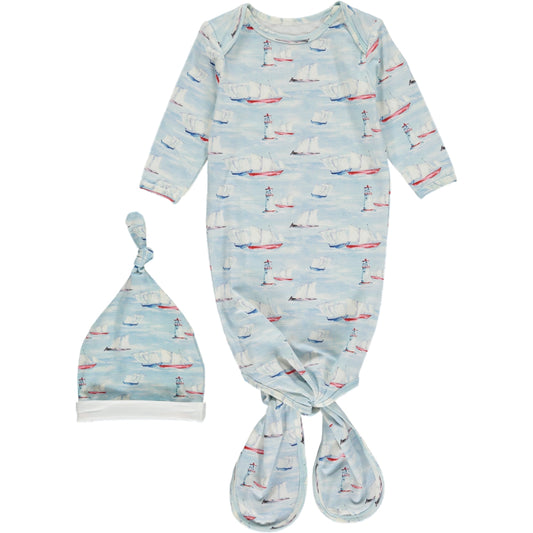 long knotted gown with long sleeves and matching knotted hat, in traditional sailing boat watercolor print on a light blue background, made of bamboo fabric
