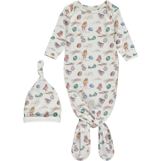 long knotted gown with long sleeves and matching knotted hat, in soft blue and pink watercolor chick and eggs print on a white background, made of bamboo fabric
