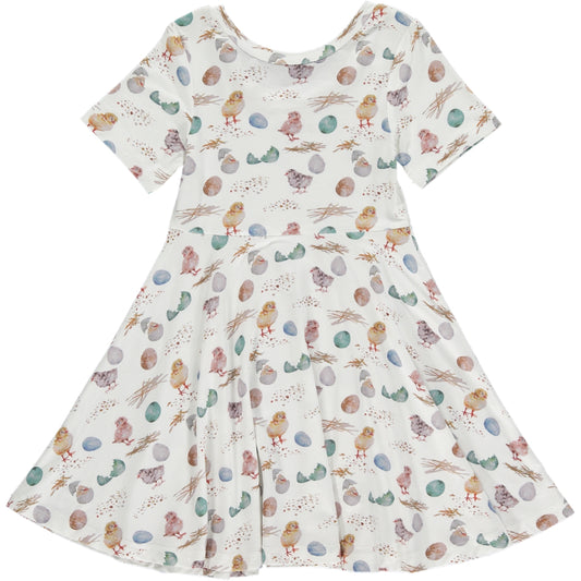 knee length twirl dress with short sleeves and scoop neckline, in soft blue and green watercolor chicks and eggs print on a white background, made of bamboo fabric
